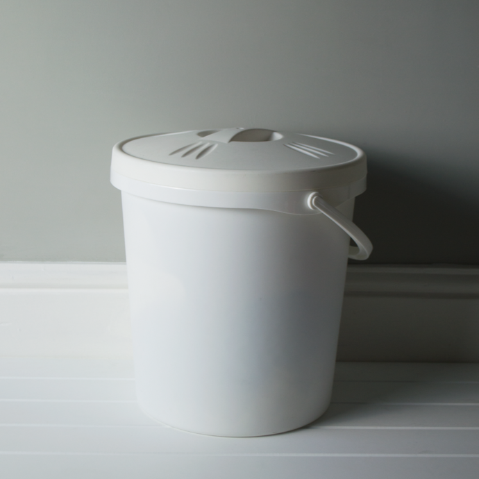 Nappy Bucket with lid and handle.